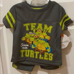 New with tags. 2 piece shirt and shorts set.